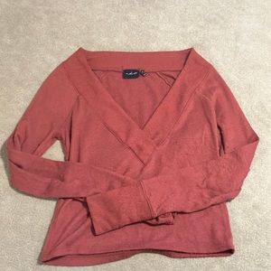 Orange deep v neck sweater from Urban Outfitters